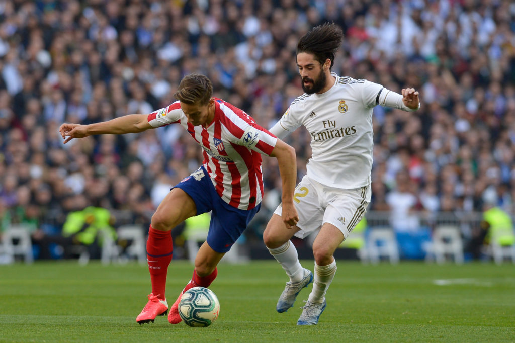 Isco y Llorente durante el partido entre el derby madrileño.